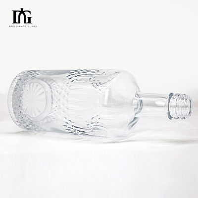 Η επιφάνεια του οξέος στρογγυλή 550 ml 700 ml οινοπνευματώδη ποτά γυάλινο μπουκάλι για ανθρακούχα ποτά
