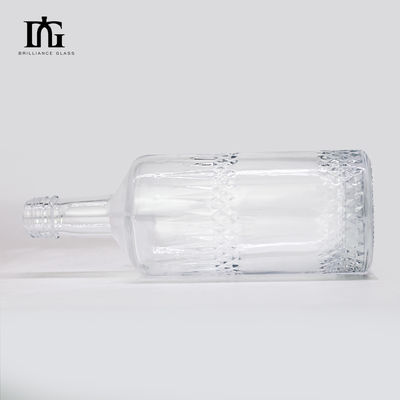 Η επιφάνεια του οξέος στρογγυλή 550 ml 700 ml οινοπνευματώδη ποτά γυάλινο μπουκάλι για ανθρακούχα ποτά