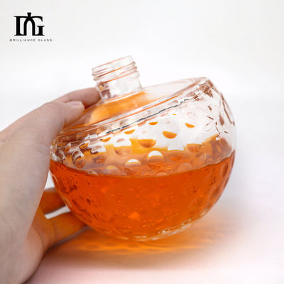 Μοναδικό σχεδιασμό 700ml διαυγές γυάλινο μπουκάλι με μοναδικό σχήμα κρανίου και χαραγμένο φελλό