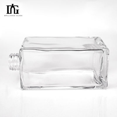Προσαρμοσμένο στρογγυλό σχήμα 700 ml Διαφανές κενό γυάλινο μπουκάλι ποτού για ουίσκι Βότκα τεκίλα